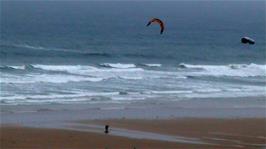 Kite flying in a stiff breeze at Watergate Bay